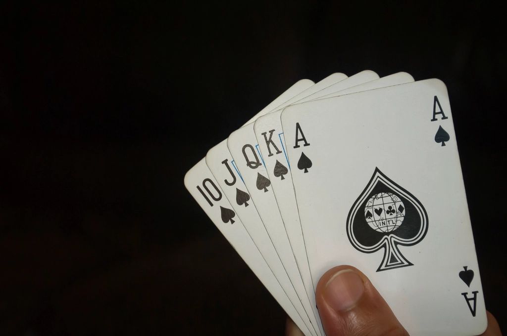Gaming chips and cards on the table felt